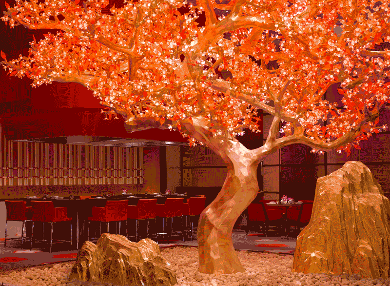 An illustration of the gilded cherry tree sculpture in the center of the room which cycles through the seasons all evening